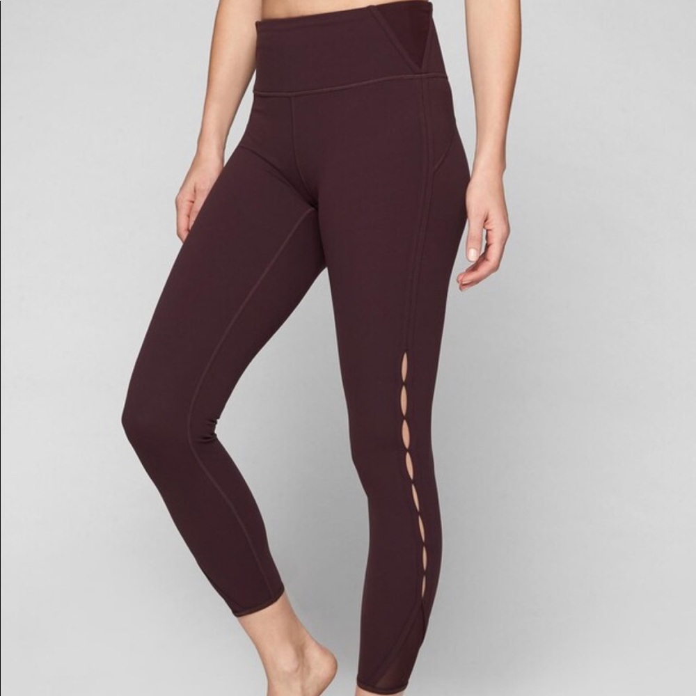 Athleta Peekaboo leggings size medium.